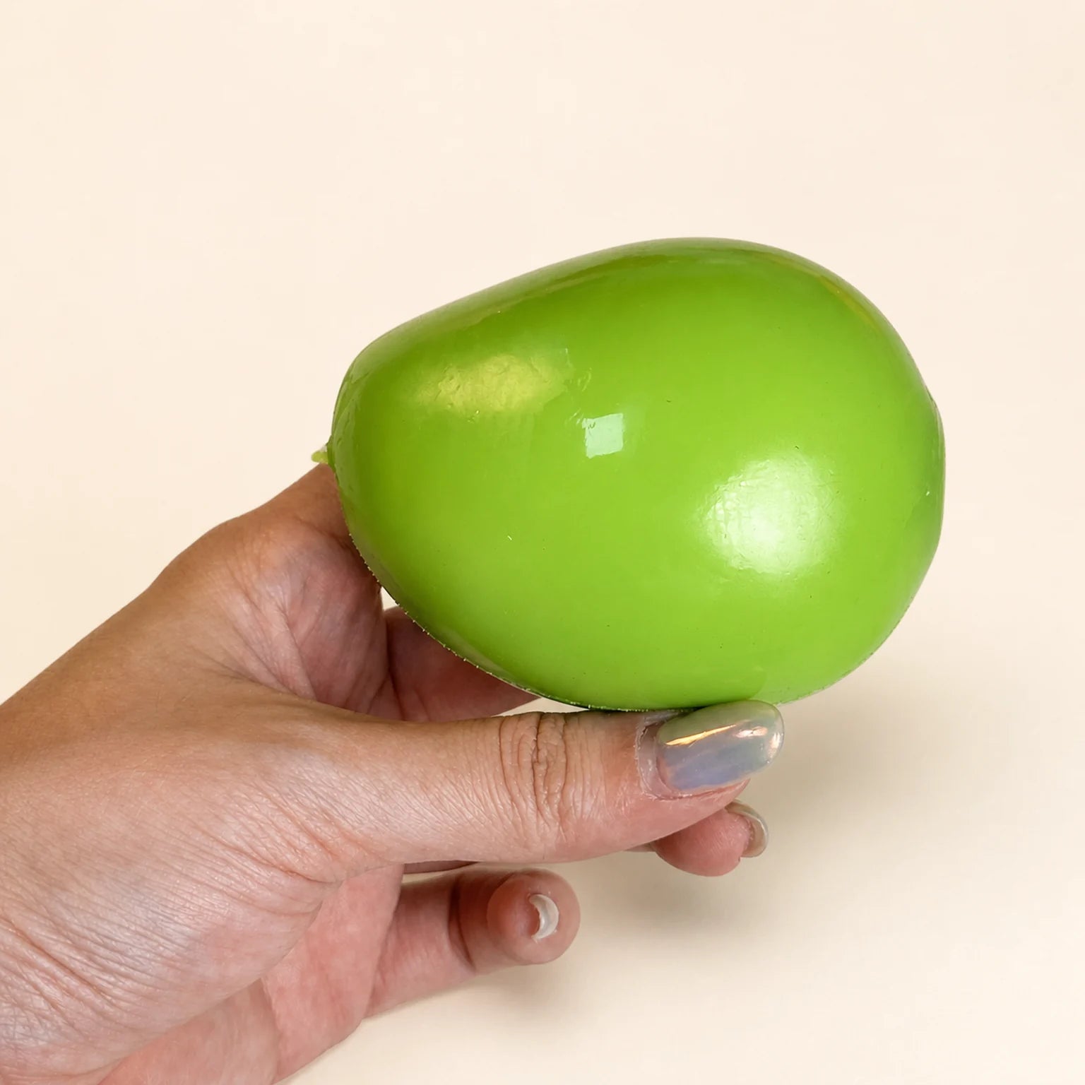 Heatwave Mango Crunch sensory ball held in hand