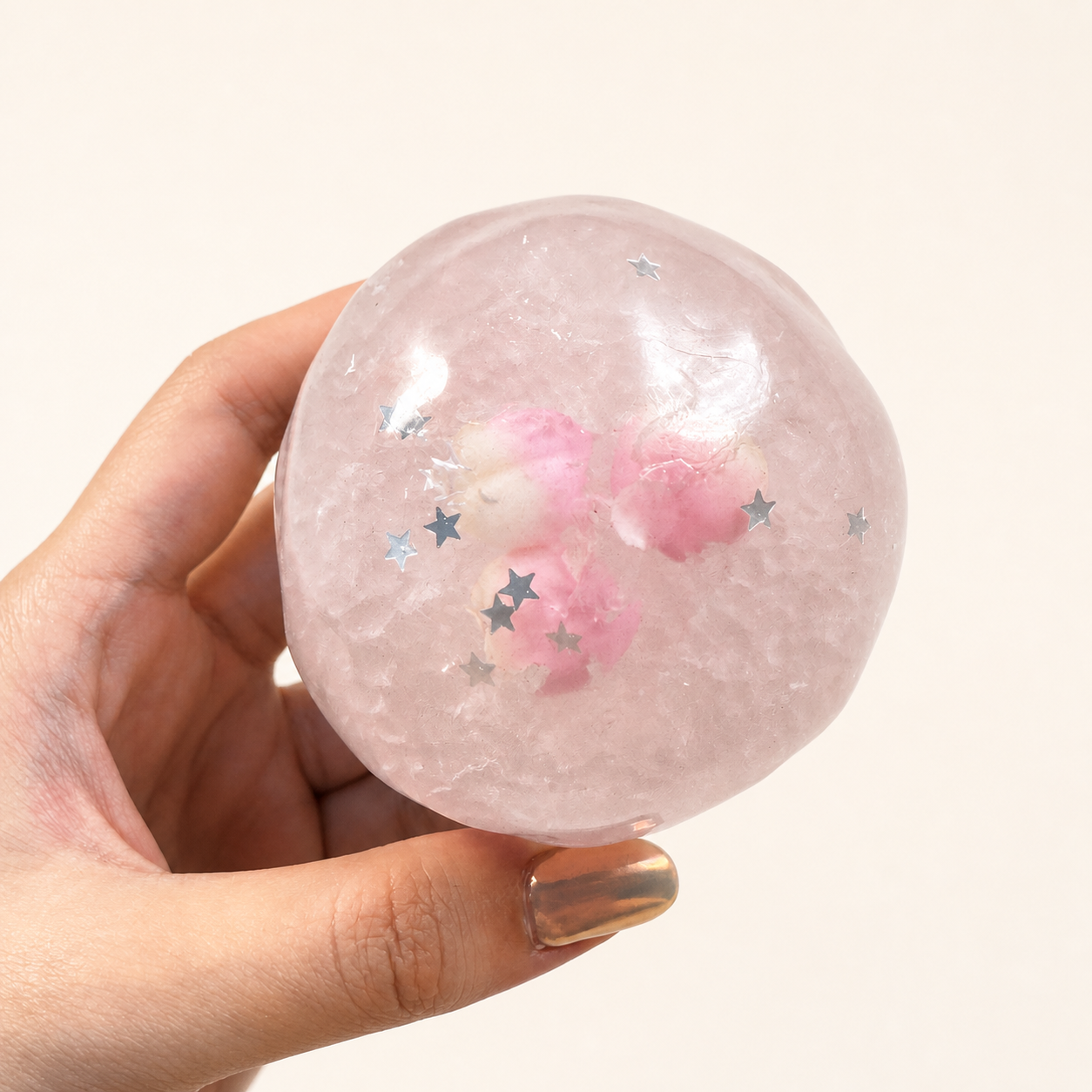 Front detail of the pink Peach Stardust Slush Sensory Ball